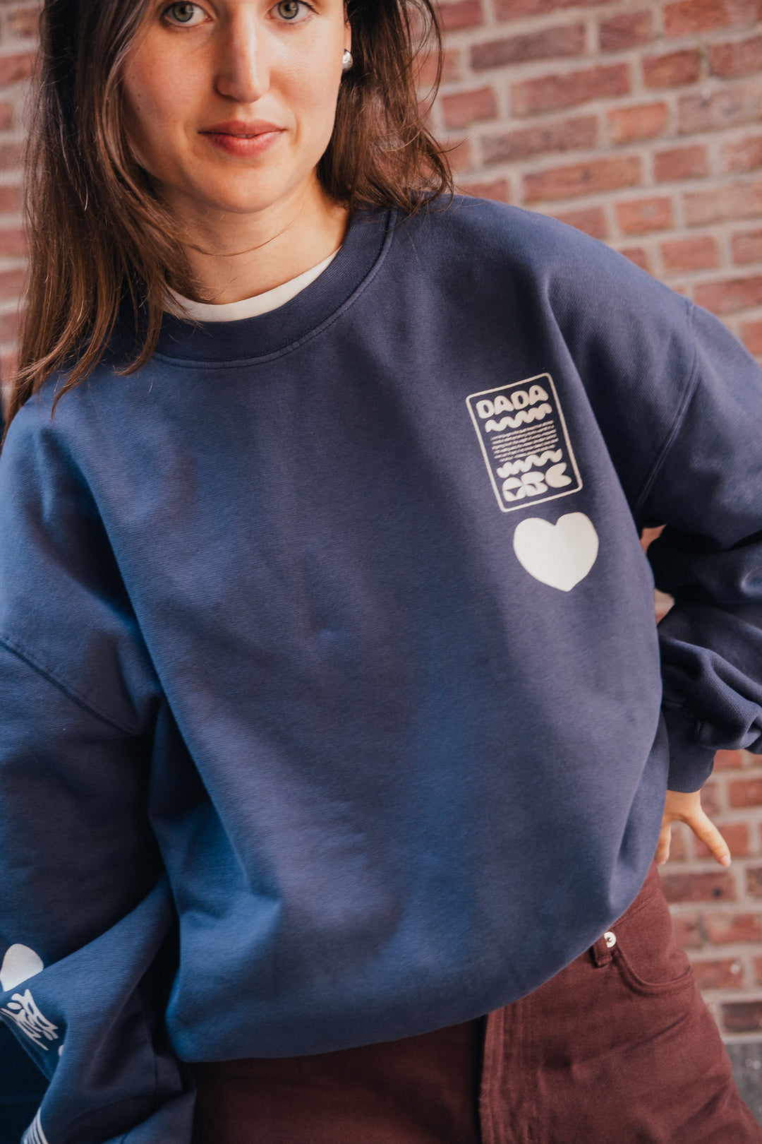 Dada signs Sweat