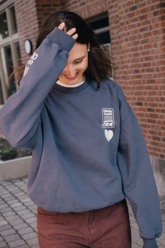 Dada signs Sweat